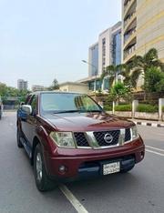 Nissan Navara 2.5 dCi 2010 Maroon for sale