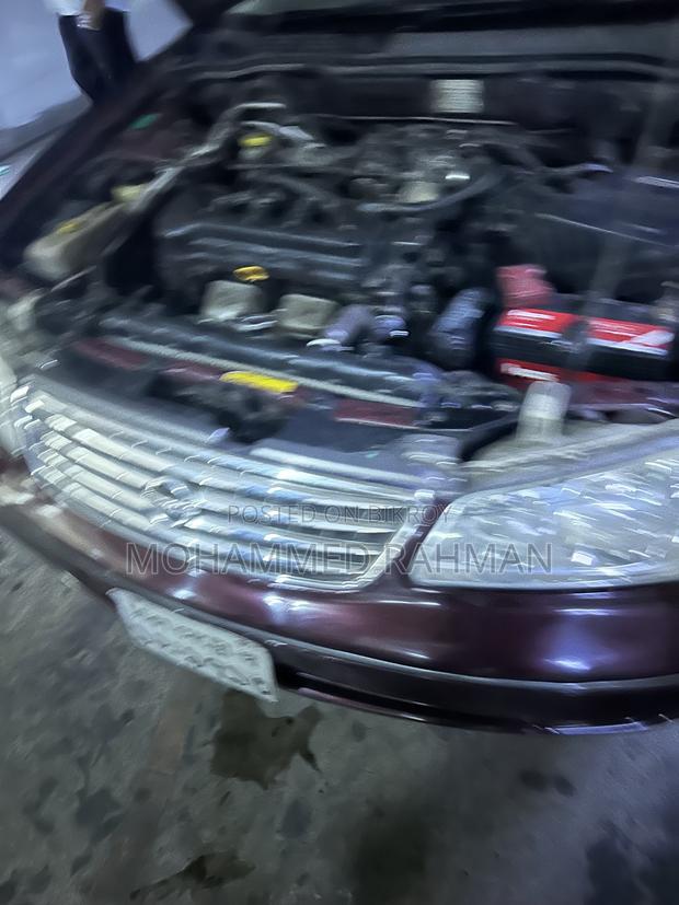 Nissan Sunny 2009 Maroon