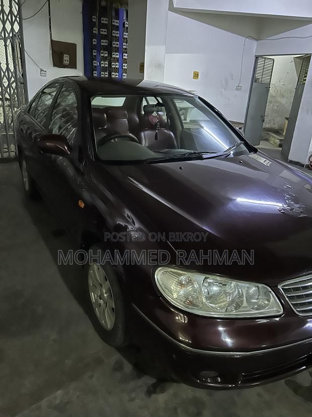 Nissan Sunny 2009 Maroon
