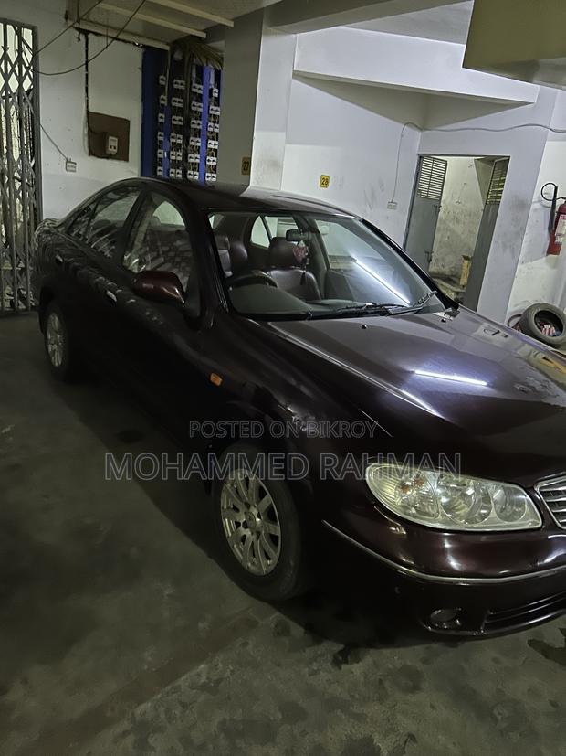 Nissan Sunny 2009 Maroon