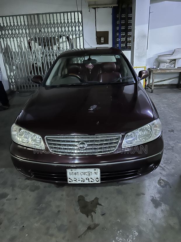 Nissan Sunny 2009 Maroon