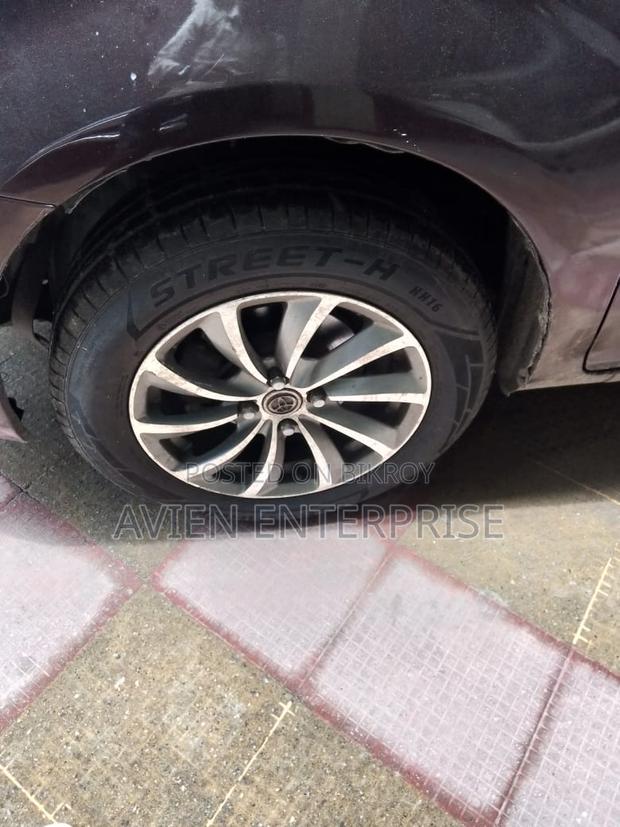 Toyota Axio 1.8 Luxel 2WD 2012 Maroon