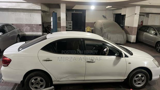 Toyota Allion . 2004