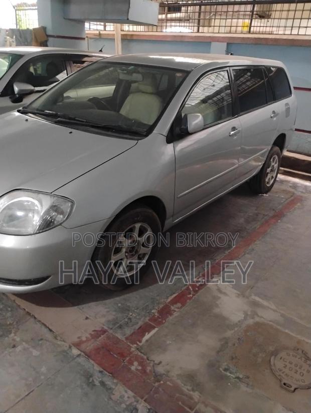 Toyota Fielder . 2003