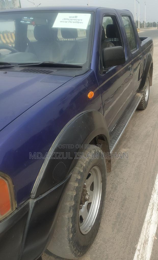 Nissan Carryboy . 2005