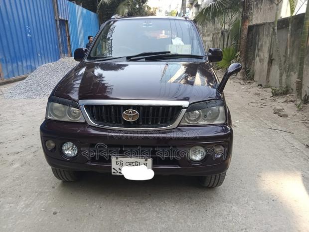Toyota Cami red wine 2001