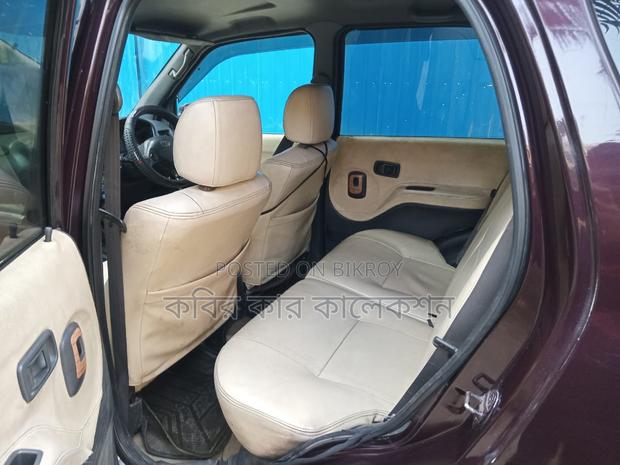 Toyota Cami red wine 2001