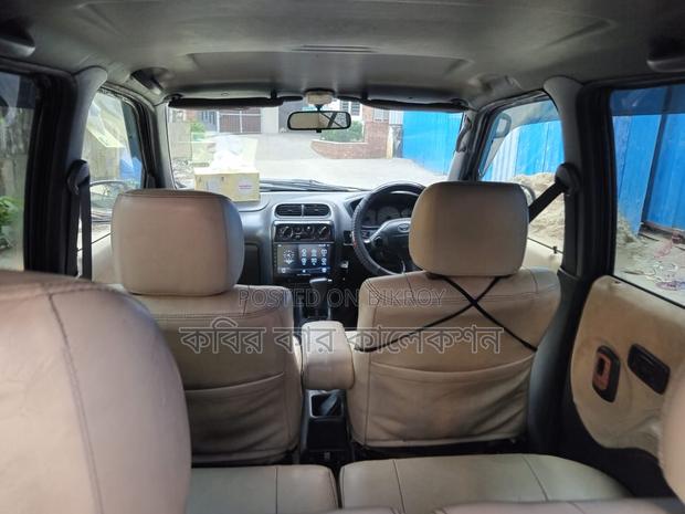 Toyota Cami red wine 2001