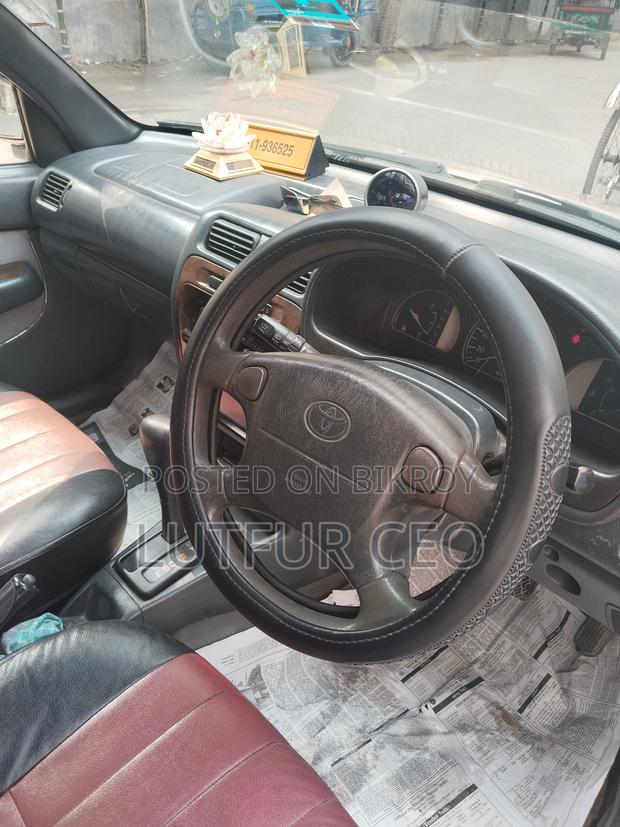 Toyota Starlet CARET 2000