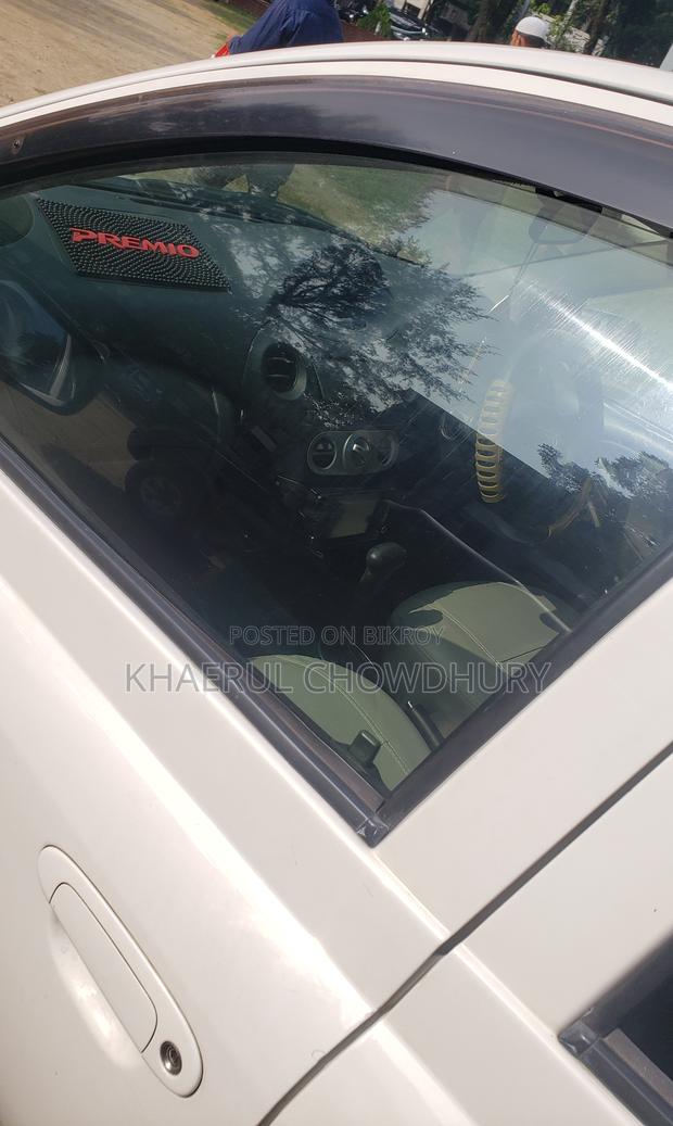 Toyota Vitz . 2004