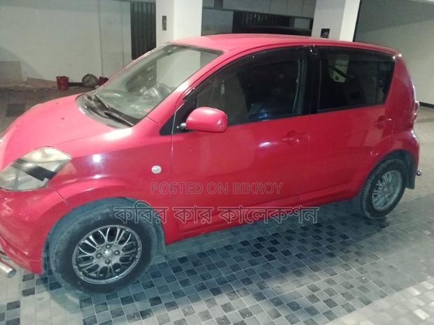 Toyota Passo red 2008