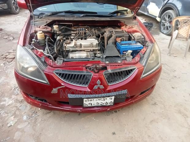 Mitsubishi Lancer . 2004