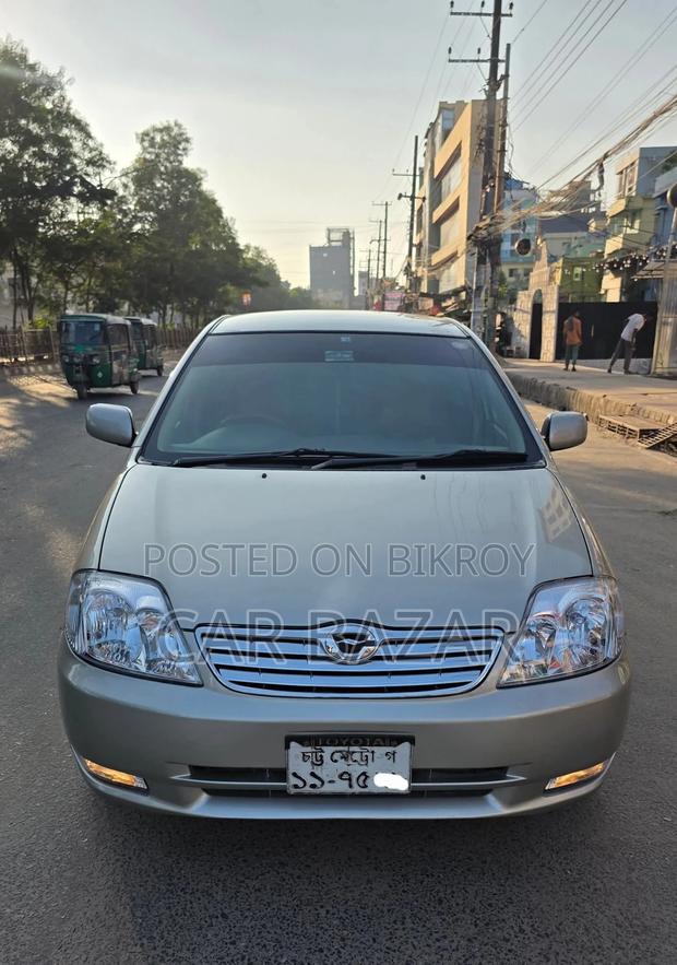 Toyota Corolla X BEIGES NZE121 2003