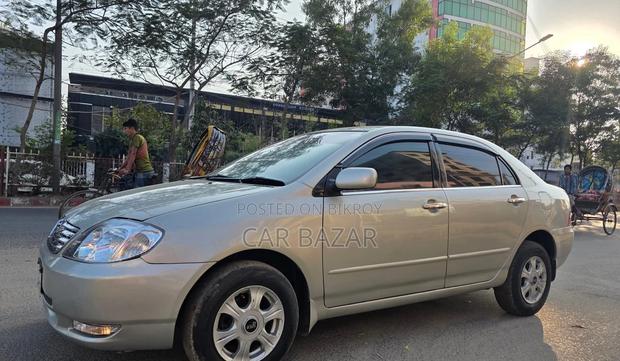Toyota Corolla X BEIGES NZE121 2003