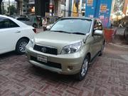 Toyota Rush 1.5 AWD 2011 Gold for sale