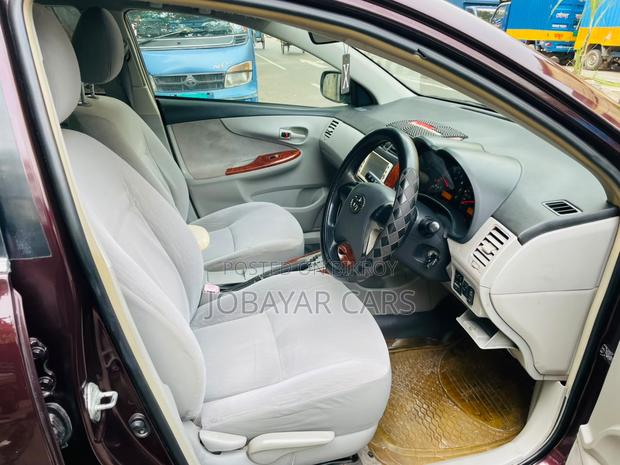 Toyota Axio 2009 Maroon
