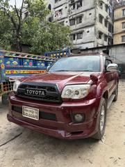 Toyota Hilux Surf 2004 Maroon for sale