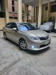 Toyota Axio 1.5 Hybrid G 2WD 2013 Beige for sale