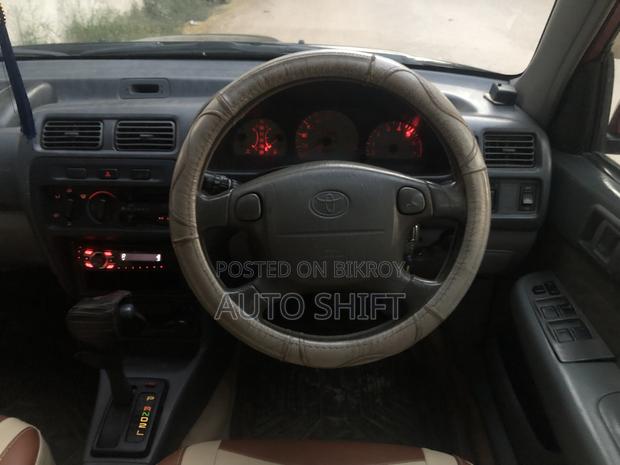 Toyota Starlet 1997 Maroon