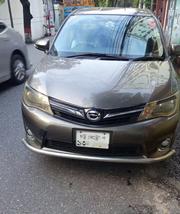 Toyota Corolla Fielder 1.5 Petrol FWD 2013 Brown for sale