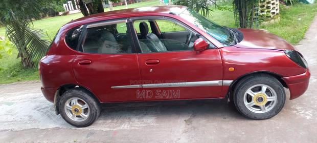Toyota Duet 2003 Red