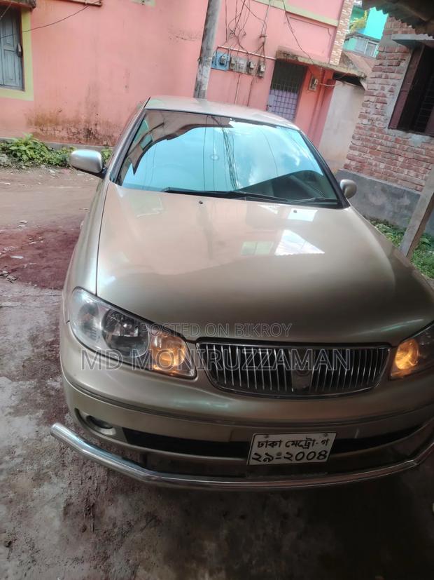Nissan Bluebird 2004 Gold