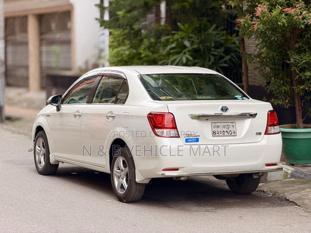 Toyota Axio 1.5 Hybrid 2WD 2013 Pearl