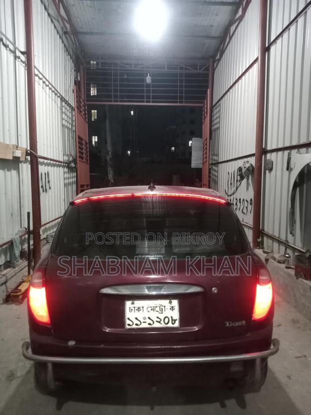 Toyota Duet 2003 Maroon