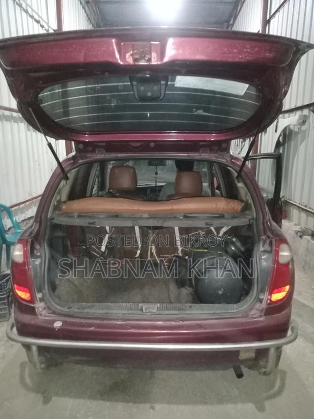 Toyota Duet 2003 Maroon