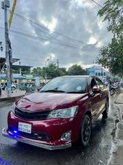 Toyota Axio 1.5 Hybrid 2WD 2014 Maroon for sale