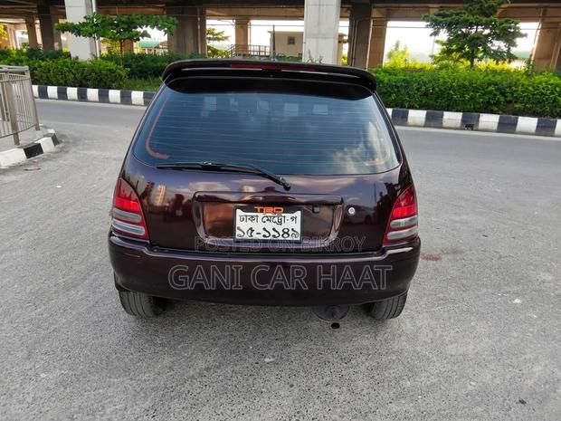 Toyota Starlet 1997 Maroon