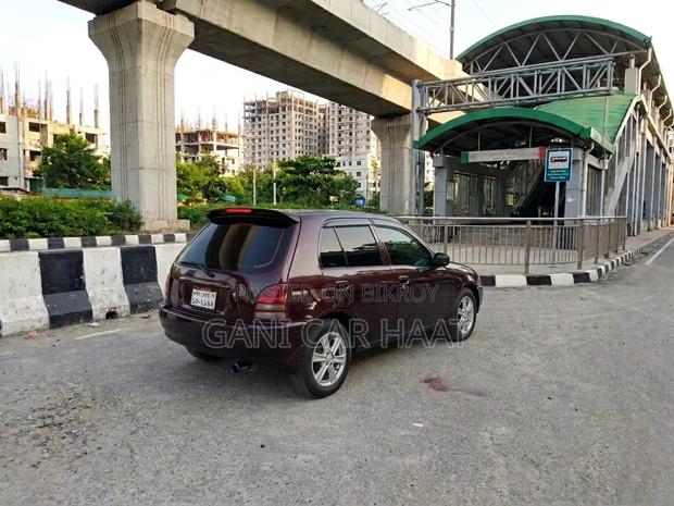 Toyota Starlet 1997 Maroon