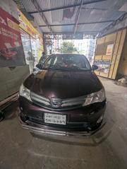 Toyota Axio 2013 Maroon for sale
