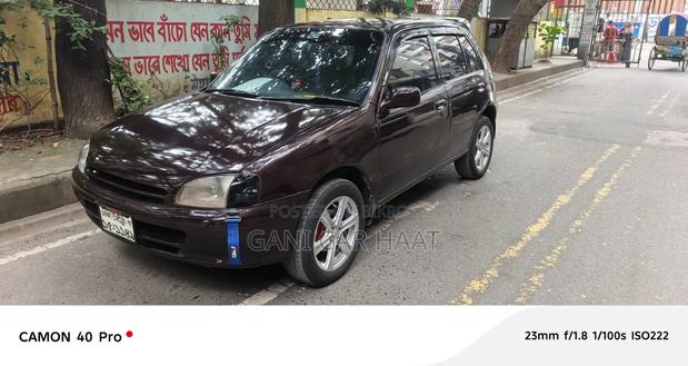 Toyota Starlet 1997 Maroon