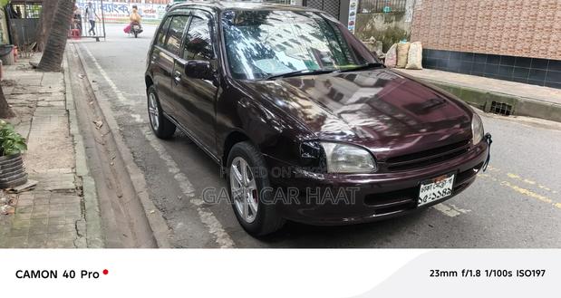 Toyota Starlet 1997 Maroon