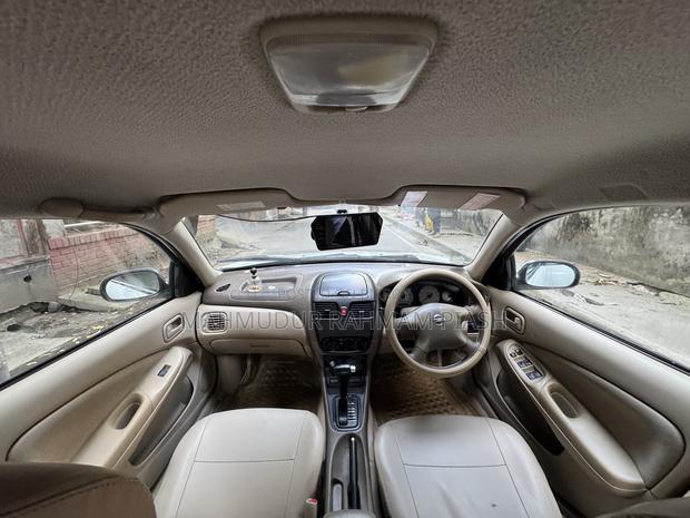 Nissan Sunny 2009 Pearl